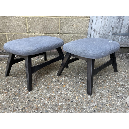 222 - A pair of grey upholstered footstools