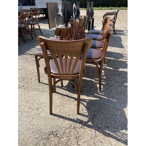 227 - A set of 9 bentwood cafe chairs with brown leather seats