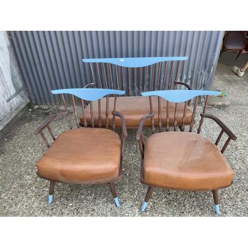 229 - A modern danish style stick back three piece suite with brown tan brown cushion seats