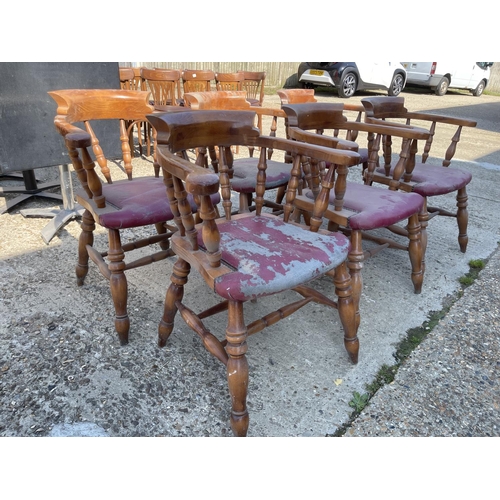 233 - A set of six smokers bow back carver chairs with upholstered seats (chairs solid, seats for re uphol... 