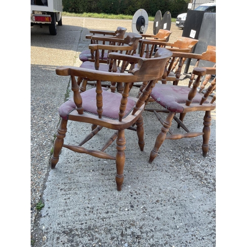 233 - A set of six smokers bow back carver chairs with upholstered seats (chairs solid, seats for re uphol... 