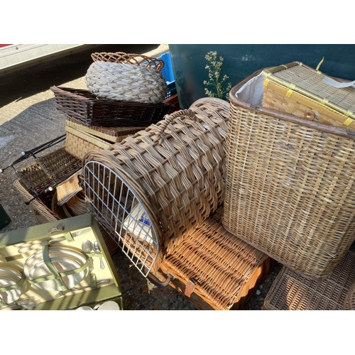 239 - Two picnic sets and a quantity of basket ware