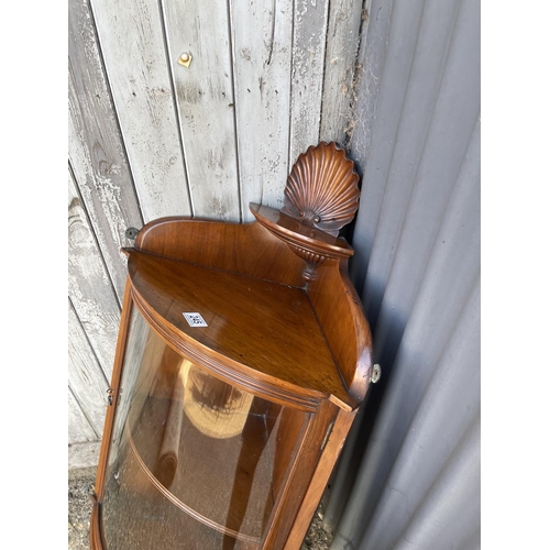 245 - A Victorian mahogany bow glass wall hanging corner cabinet