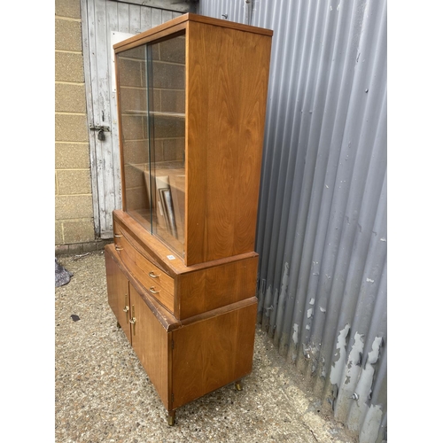 253 - A 1950's retro glazed cabinet