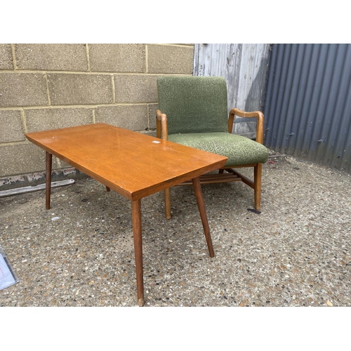 257 - A mid century chair and a retro coffee table