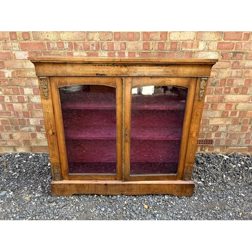 26 - An inlaid mahogany cabinet with gilt mounts  110x30x100