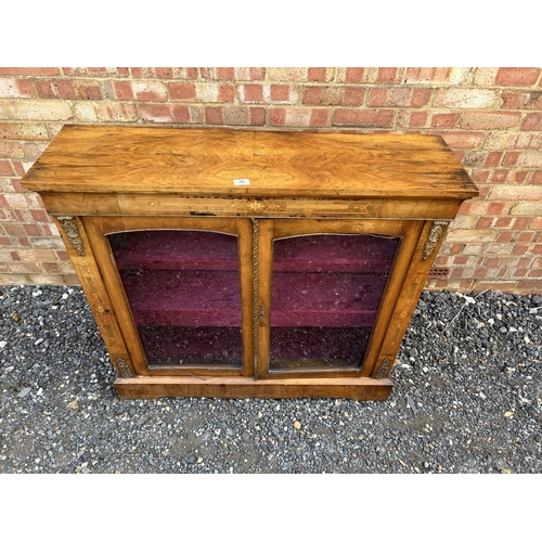 26 - An inlaid mahogany cabinet with gilt mounts  110x30x100