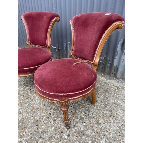 263 - A pair of red upholstered salon chairs