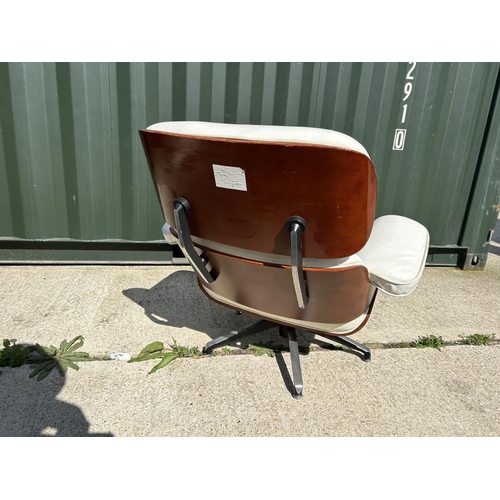 278 - A replica Charles and Ray EAMES white leather armchair