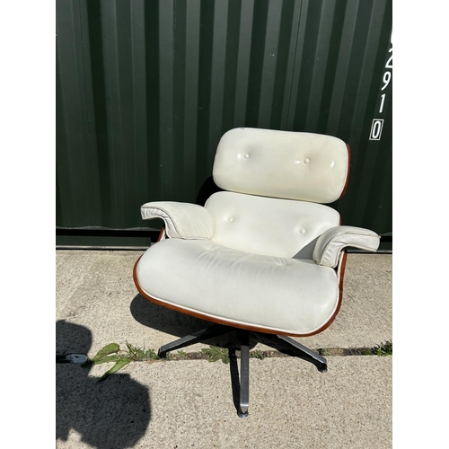 278 - A replica Charles and Ray EAMES white leather armchair