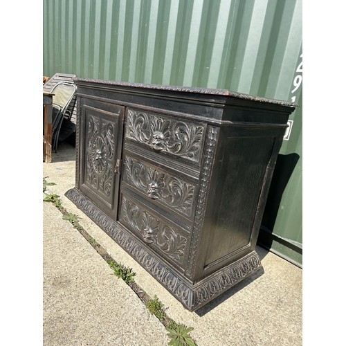 280 - A carved oak sideboard 135x50x100