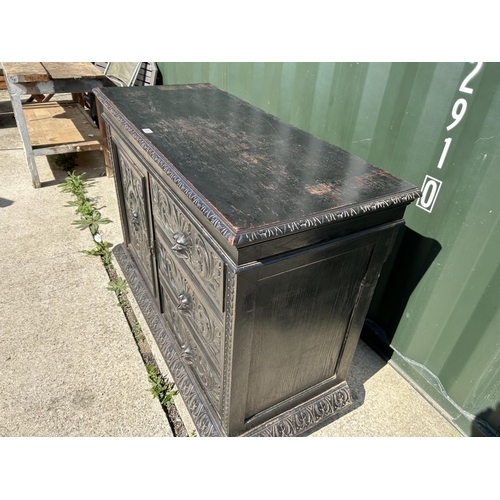 280 - A carved oak sideboard 135x50x100