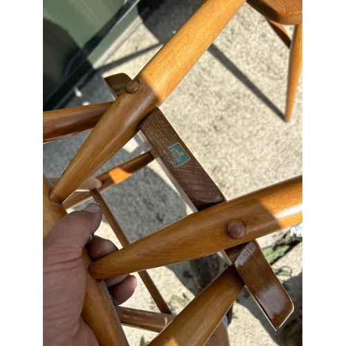 283 - A set of four original Ercol stacking chairs