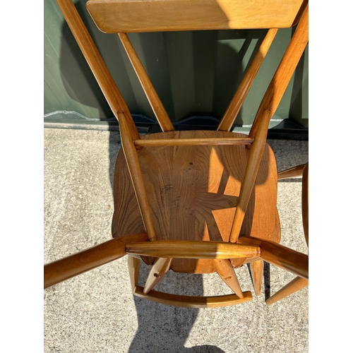 283 - A set of four original Ercol stacking chairs