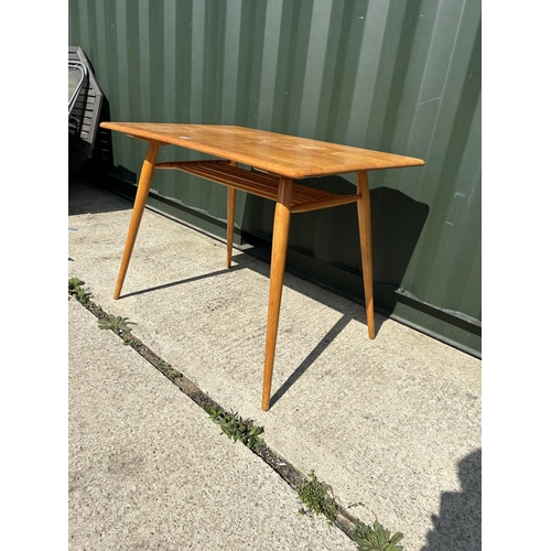 284 - A mid century Ercol kitchen table with slatted lower tier