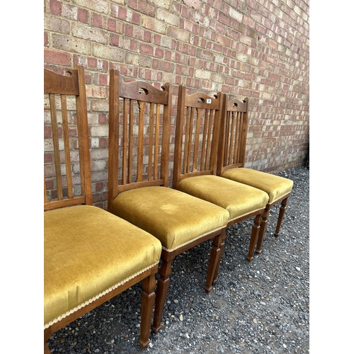 29 - A set of six early 20th century hardwood dining chairs with gold upholstered seats