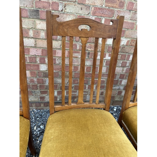 29 - A set of six early 20th century hardwood dining chairs with gold upholstered seats