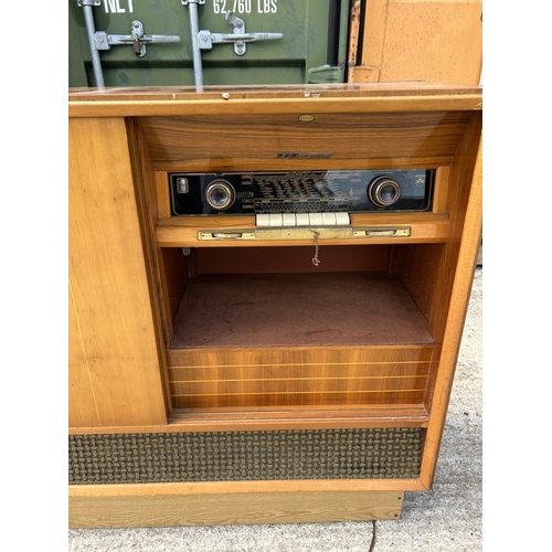 290 - A deco style walnut cased gramophone by GRUNDIG