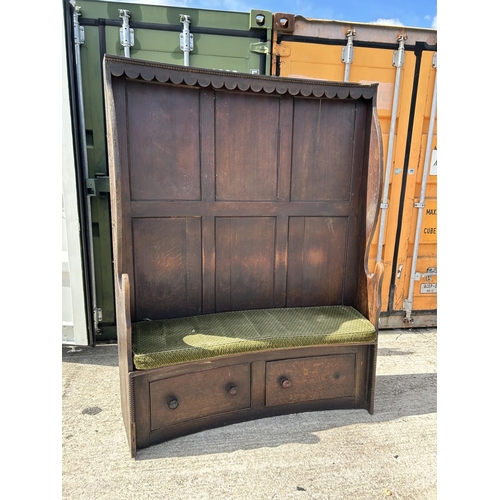 291 - An oak barrel back bench seat with two drawers 157x41x194