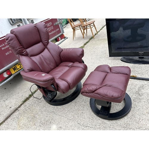 297 - A red leather reclining armchair with matching stool