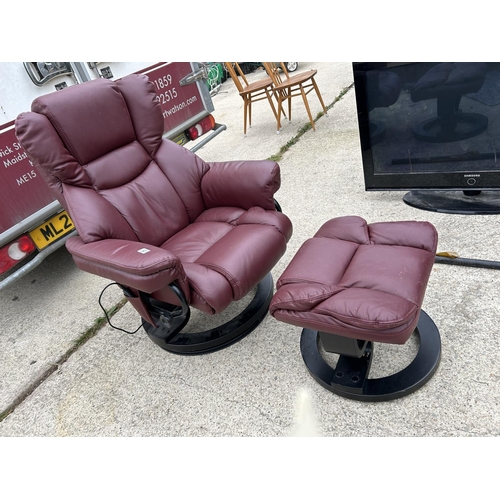 297 - A red leather reclining armchair with matching stool