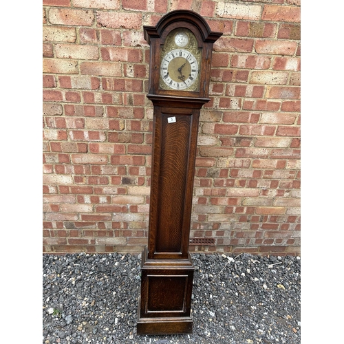 3 - An oak cased TEMPUS FUGIT grandmother clock supplied by WARING & GILLOW London