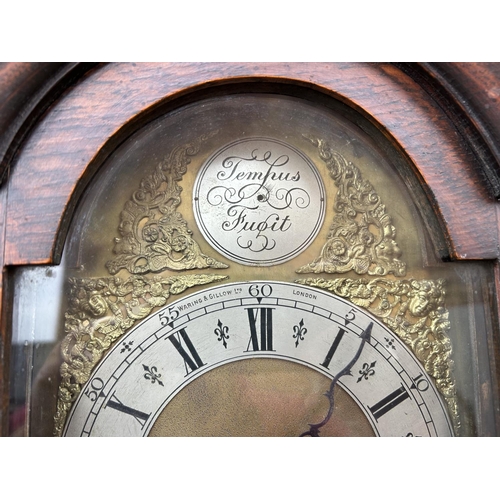 3 - An oak cased TEMPUS FUGIT grandmother clock supplied by WARING & GILLOW London