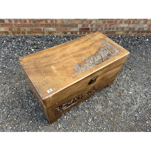 30 - An oriental carved camphor wood blanket box trunk 103x52x60