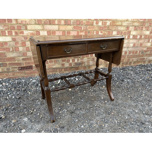 31 - A reproduction two drawer hall table