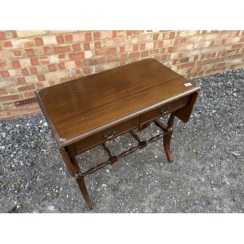 31 - A reproduction two drawer hall table