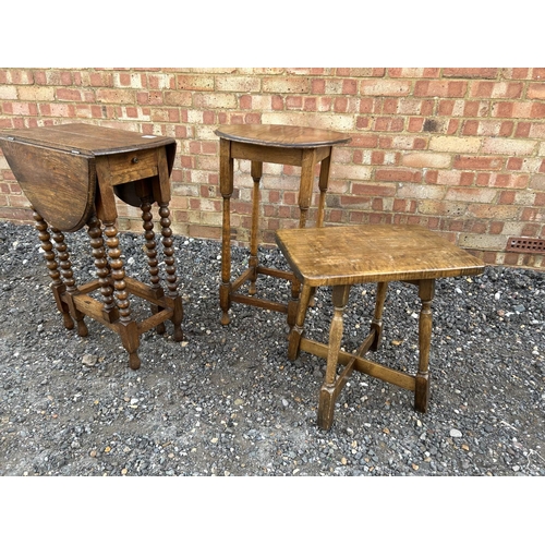 32 - An oak bobbin leg gateleg table together with two other small oak tables