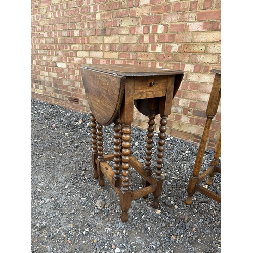 32 - An oak bobbin leg gateleg table together with two other small oak tables