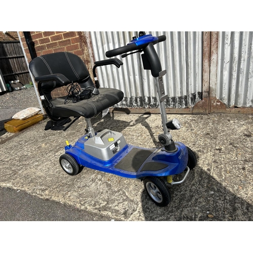 50 - A compact blue ILLUSION mobility scooter with key and charger