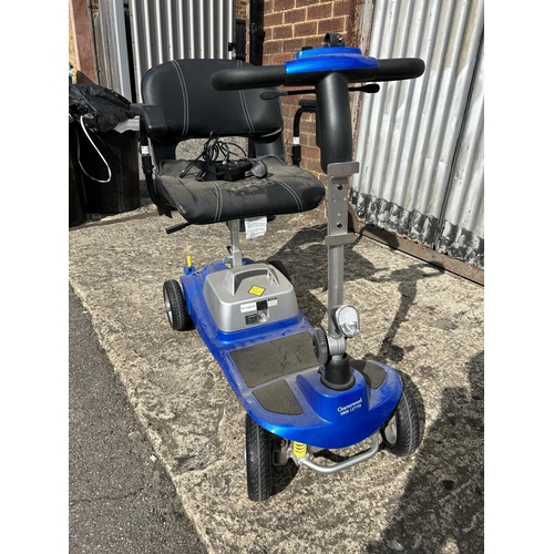 50 - A compact blue ILLUSION mobility scooter with key and charger