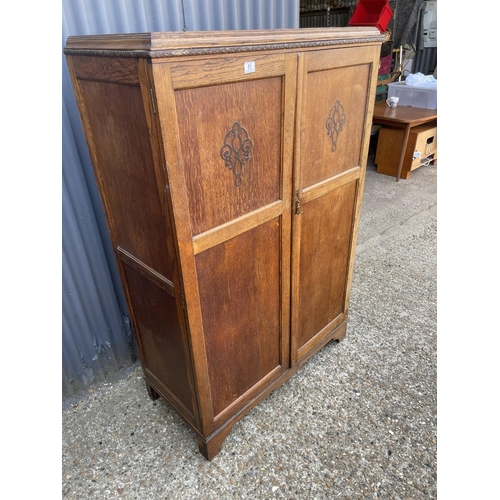 51 - An early 20th century oak gents wardrobe with fitted interior 102x48x119