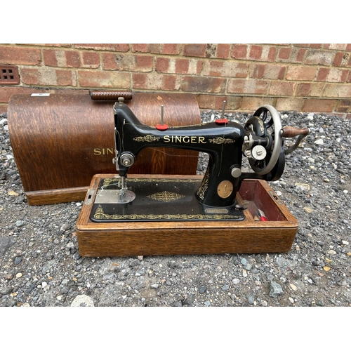 6 - Oak cased singer sewing machine