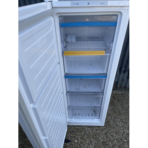 62 - A Beko larder freezer