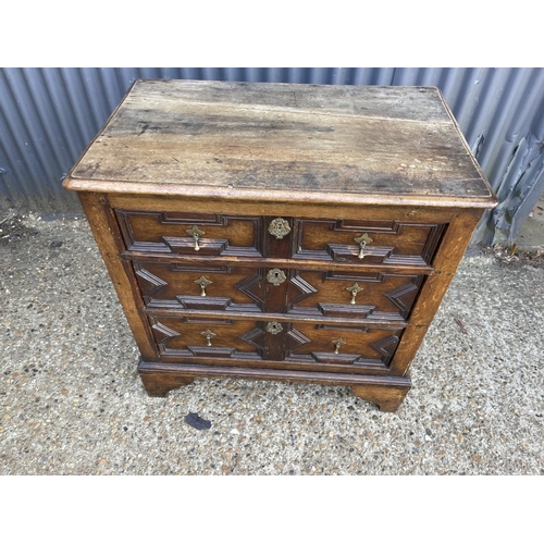 73 - A Jacobean style oak chest of three drawers 85x50x 90