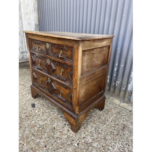 73 - A Jacobean style oak chest of three drawers 85x50x 90