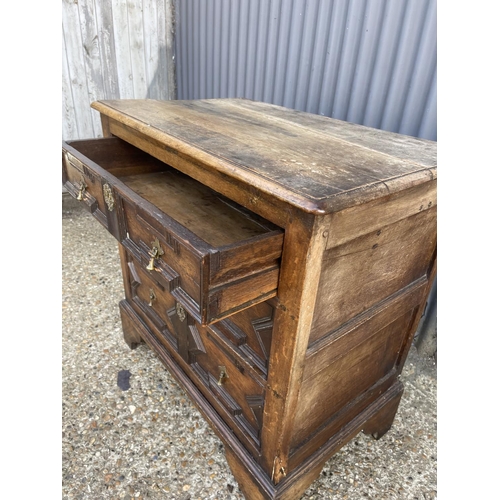 73 - A Jacobean style oak chest of three drawers 85x50x 90