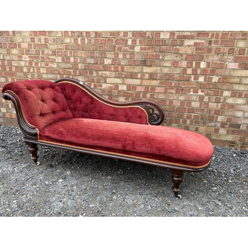 8 - A red upholstered Victorian chaise longue 184 cm long