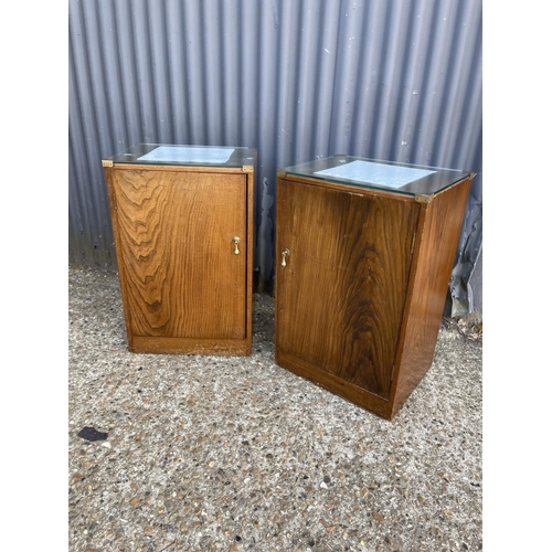 92 - A pair of oak single door bedsides with brass drop handles