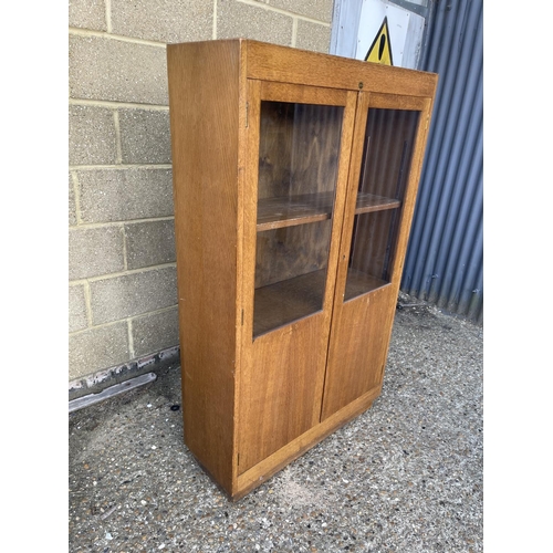 96 - A early 20th century oak bookcase by ASTROLA 87x32x122