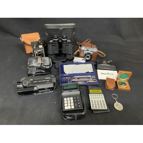 1047 - Cameras, binoculars, geometry set & calculators