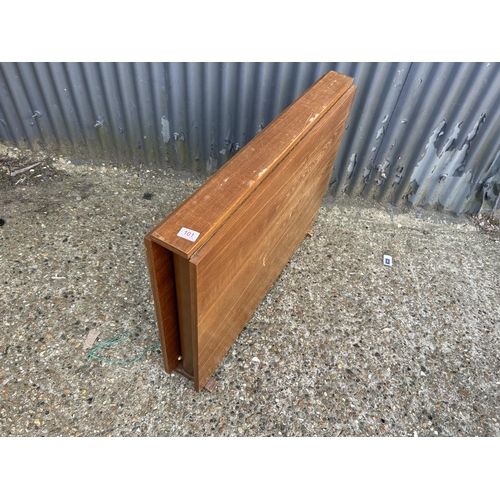 101 - A slim mid century teak gate-leg table