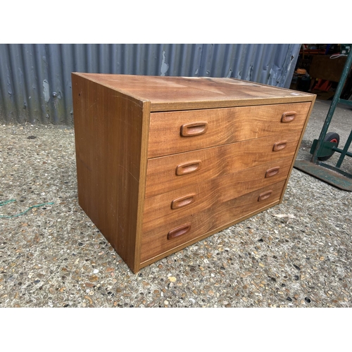 102 - A mid century teak chest of five drawers