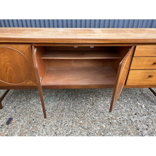 104 - A mid century nathan teak CIRCLES sideboard