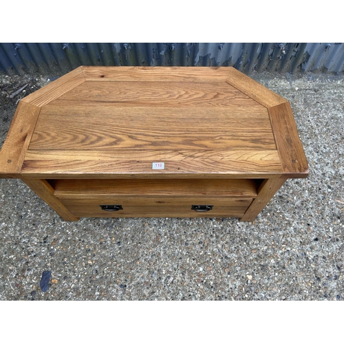 111 - A light oak tv stand with drawer