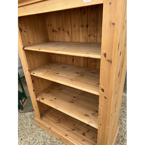 114 - A solid pine open fronted bookcase 96x44x140