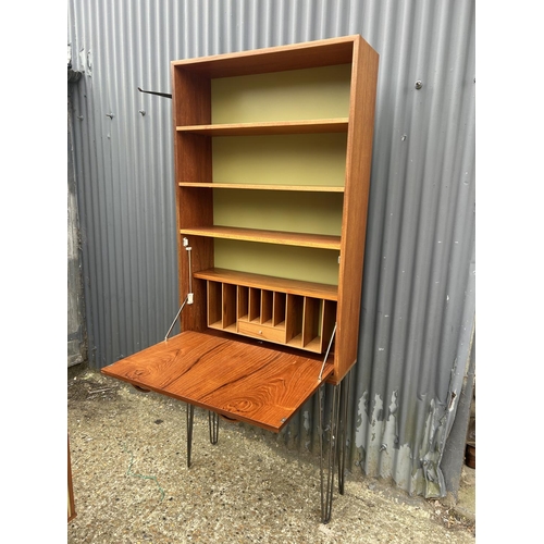 118 - A mid century g plan teak bureau unit on hairpin legs 84x26x202